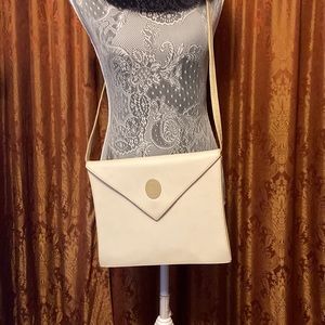 Vintage Trussardi envelope clutch with removable strap. Off white and beige.